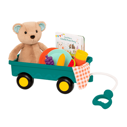 Plush bear with picnic playset and book.