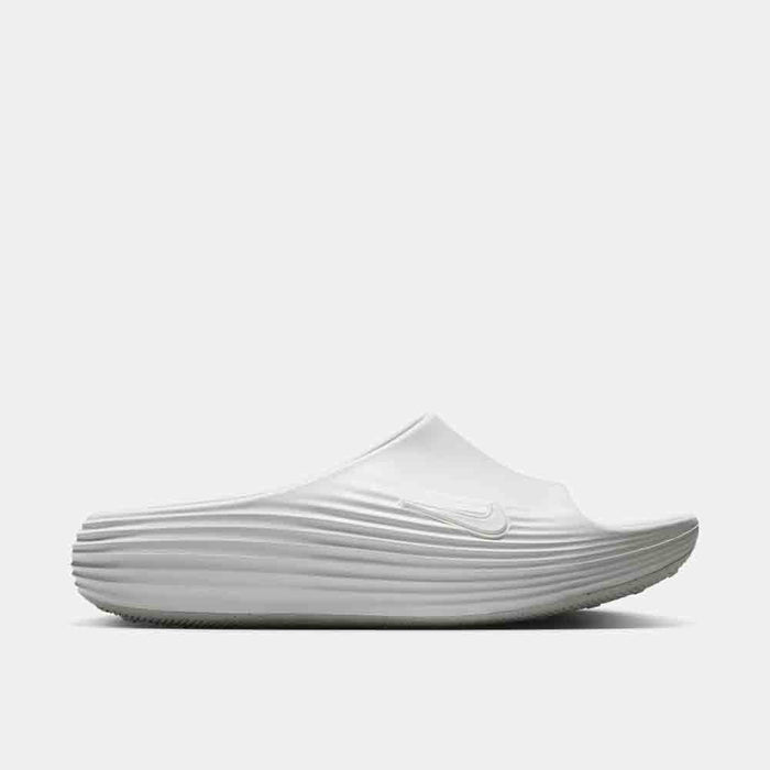 Side view of the Nike ReactX Rejuven8 Slides.