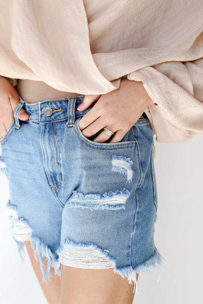 Bottom Line Distressed Denim Shorts